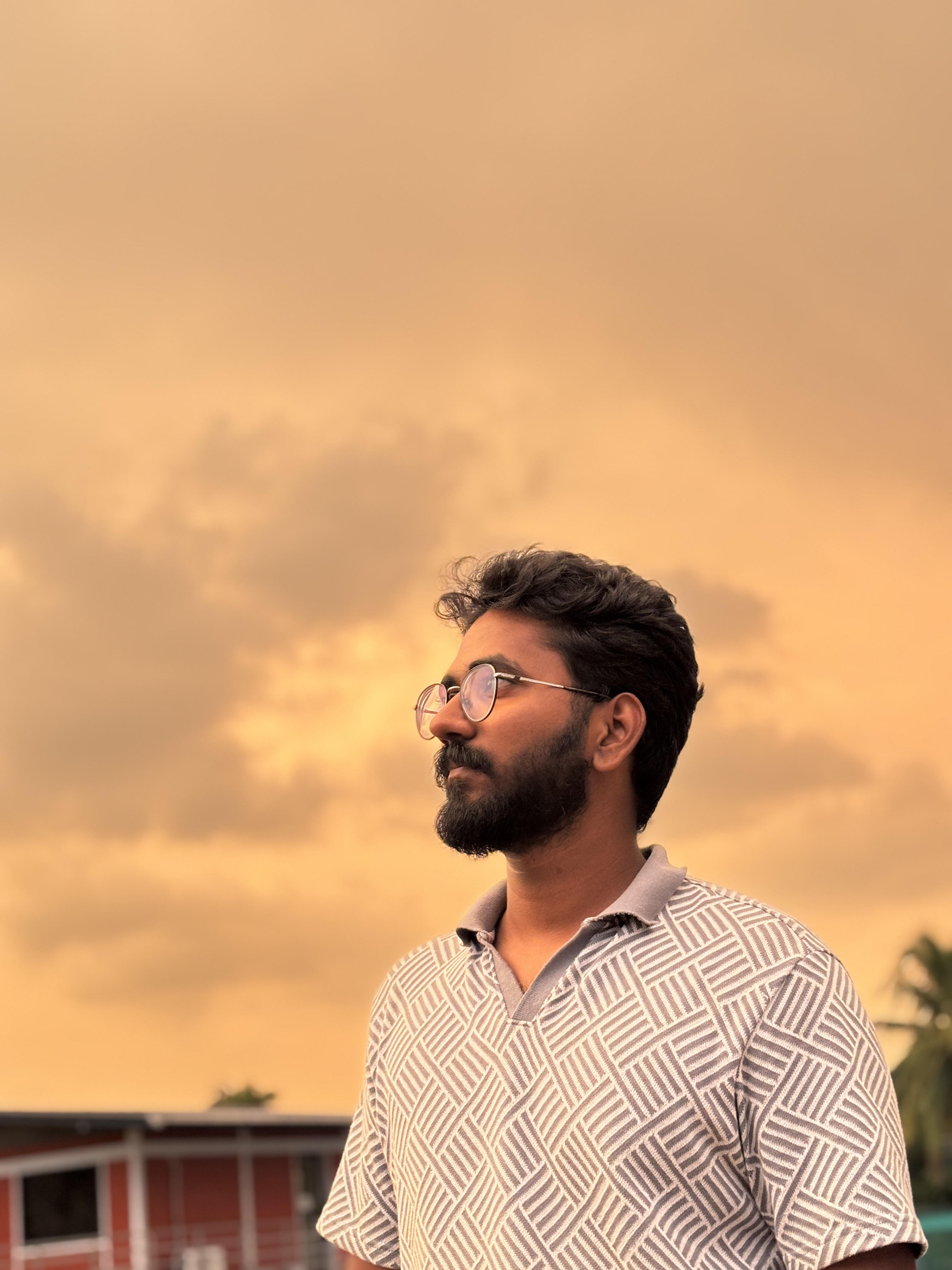 Marshal Michael Raj against a warm sunset sky